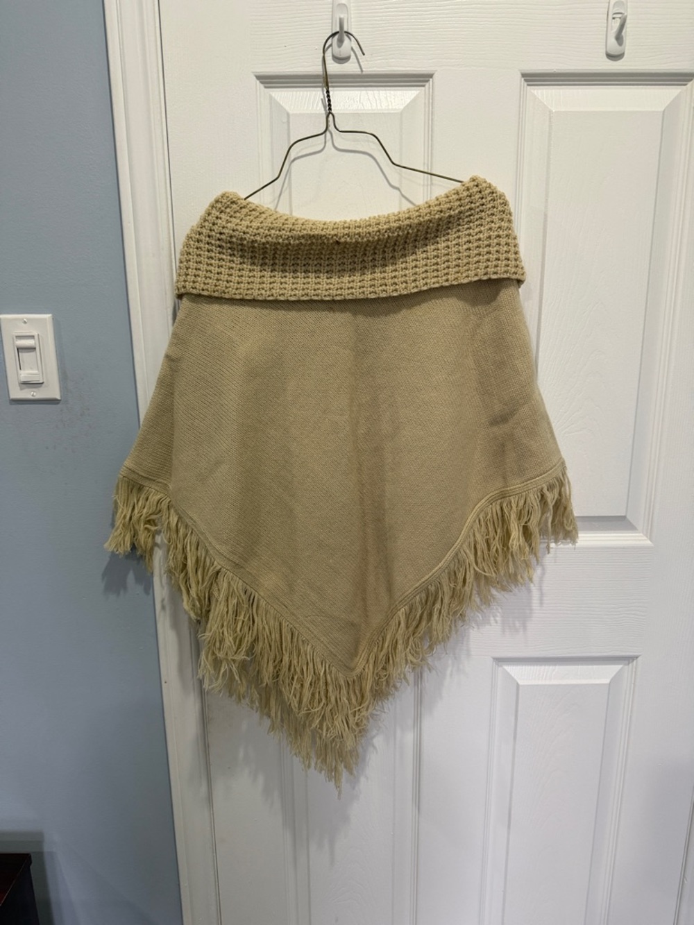 Fringed Knit Poncho with Fold-Over Collar